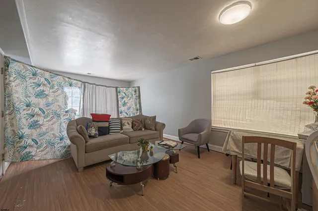 a room with a bed and window