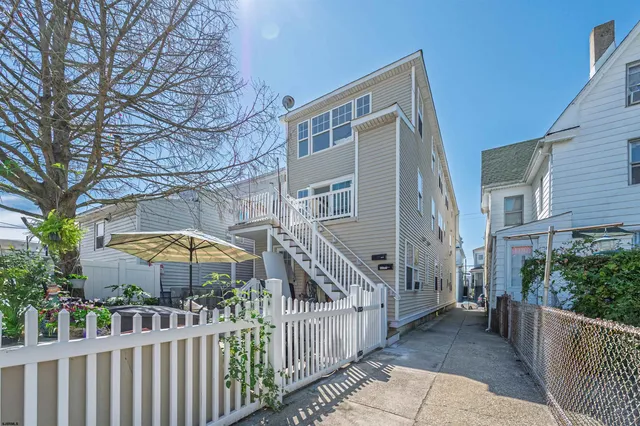 a front view of house with street