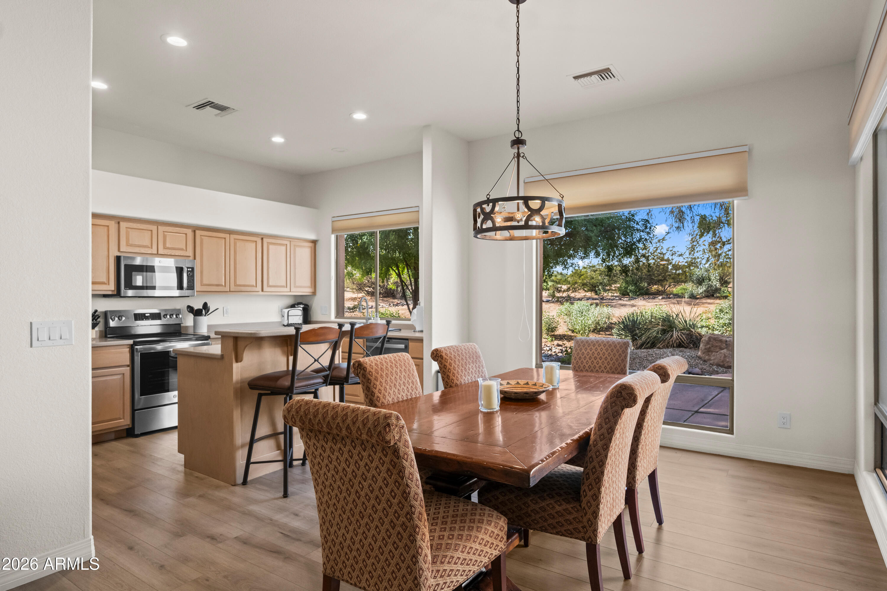 27504 North Montana Drive Rio Verde, AZ 85263 - Photo 12 of 32 a view of a dining room with furniture window and outside view