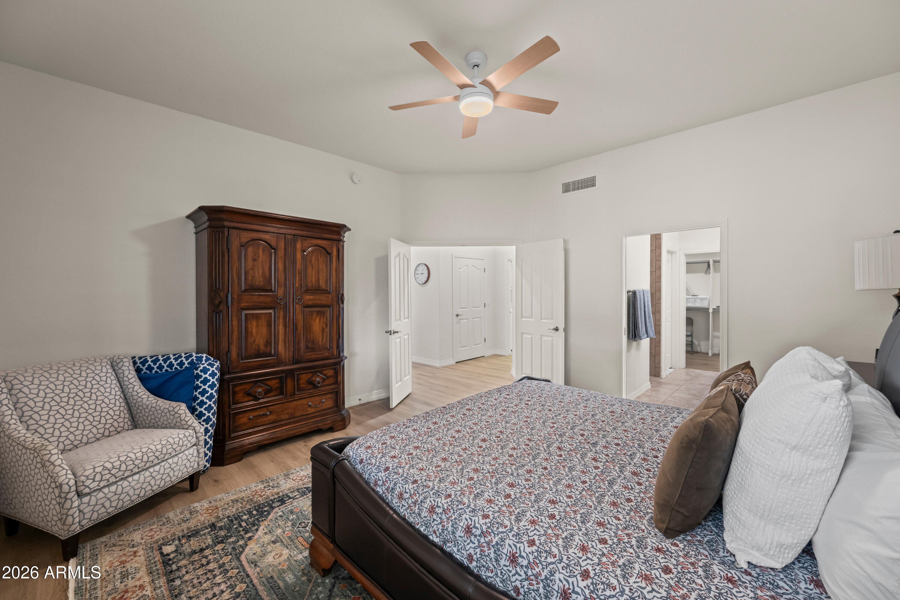 27504 North Montana Drive Rio Verde, AZ 85263 - Photo 20 of 32 a bedroom with a bed couch and dresser