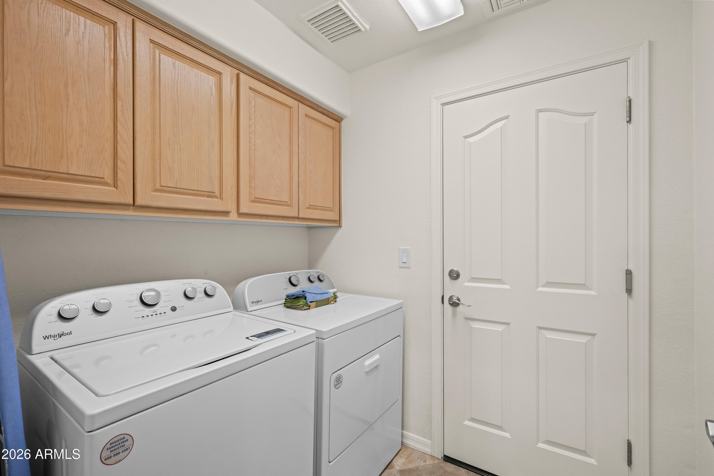 27504 North Montana Drive Rio Verde, AZ 85263 - Photo 27 of 32 a view of storage and utility room with washer and dryer