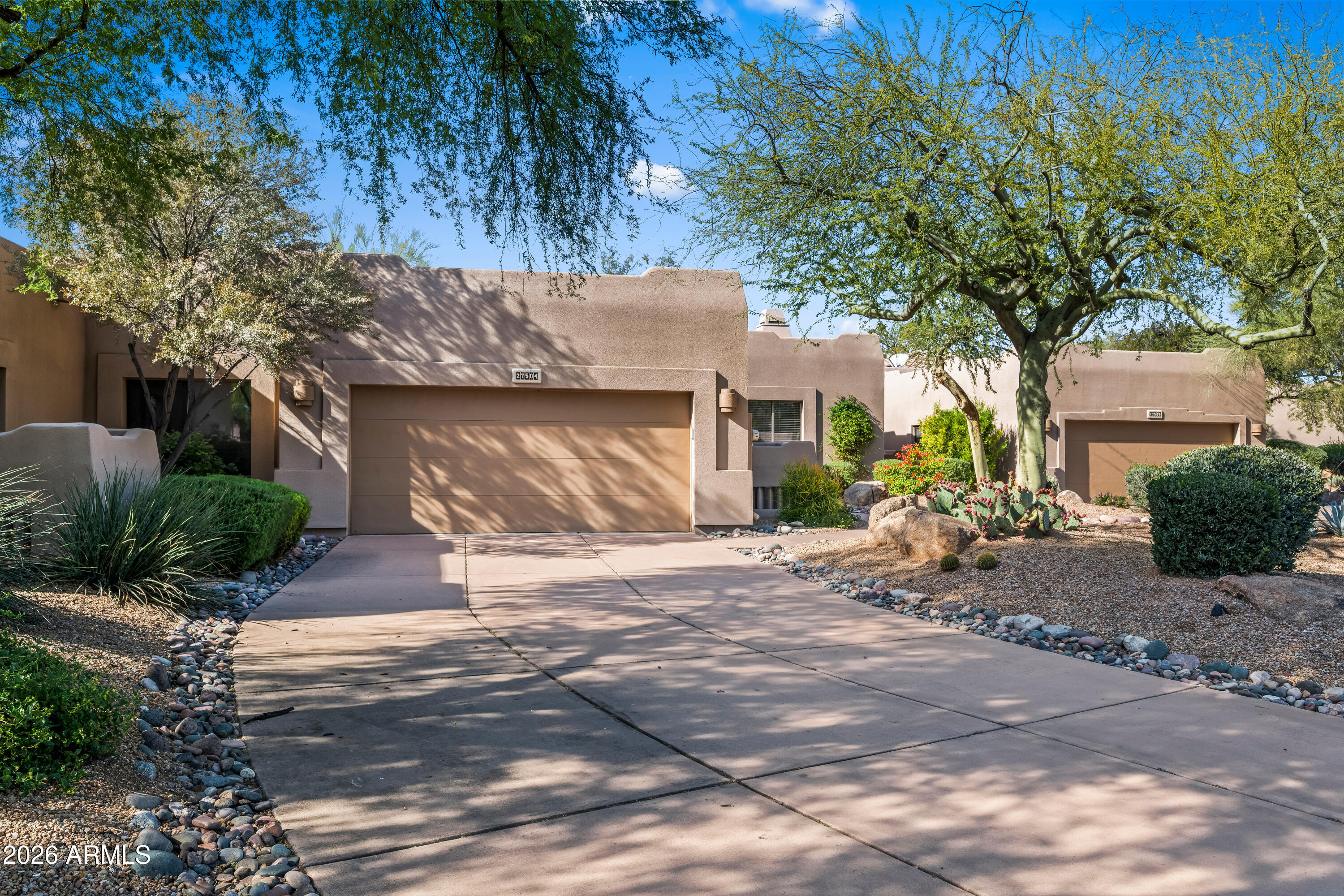 27504 North Montana Drive Rio Verde, AZ 85263 - Photo 4 of 32 a view of a house with a tree next to a road