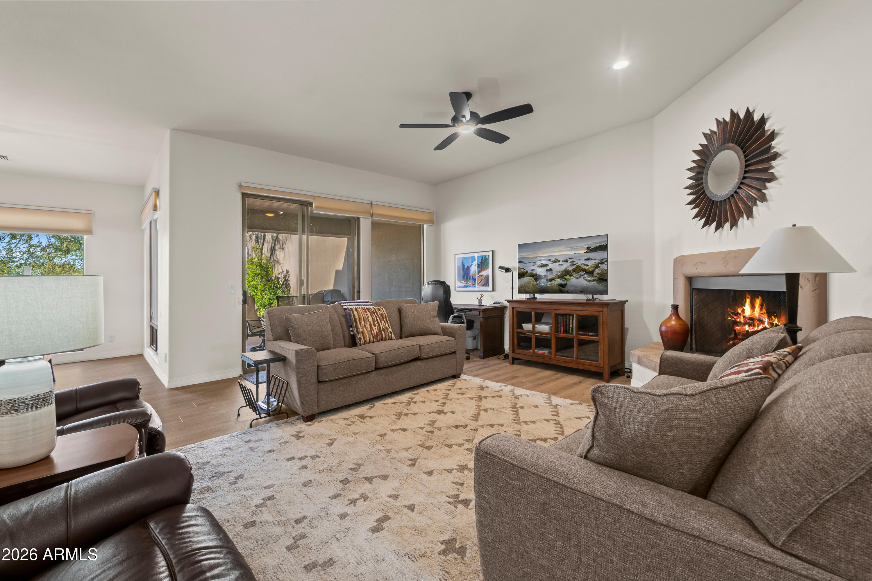27504 North Montana Drive Rio Verde, AZ 85263 - Photo 10 of 32 a living room with furniture and a fireplace