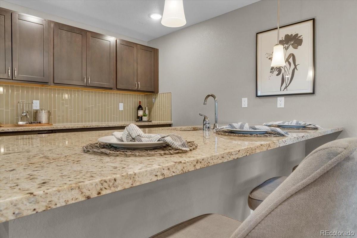 1721 Wingfeather Lane Castle Rock, CO 80108 - Photo 40 of 49 a bathroom with a sink and a mirror