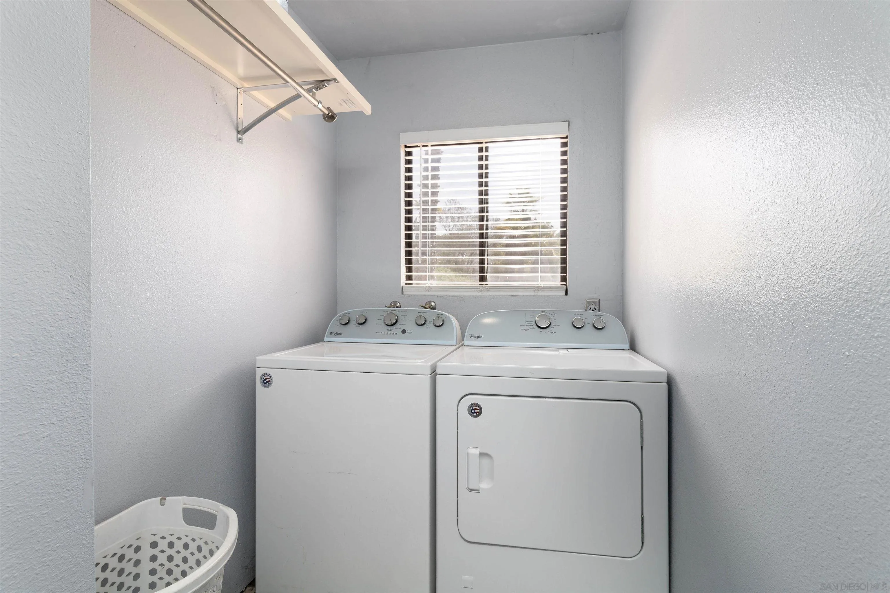 14011 Proctor Valley Road Jamul, CA 91935 - Photo 19 of 36 a utility room with dryer and washer