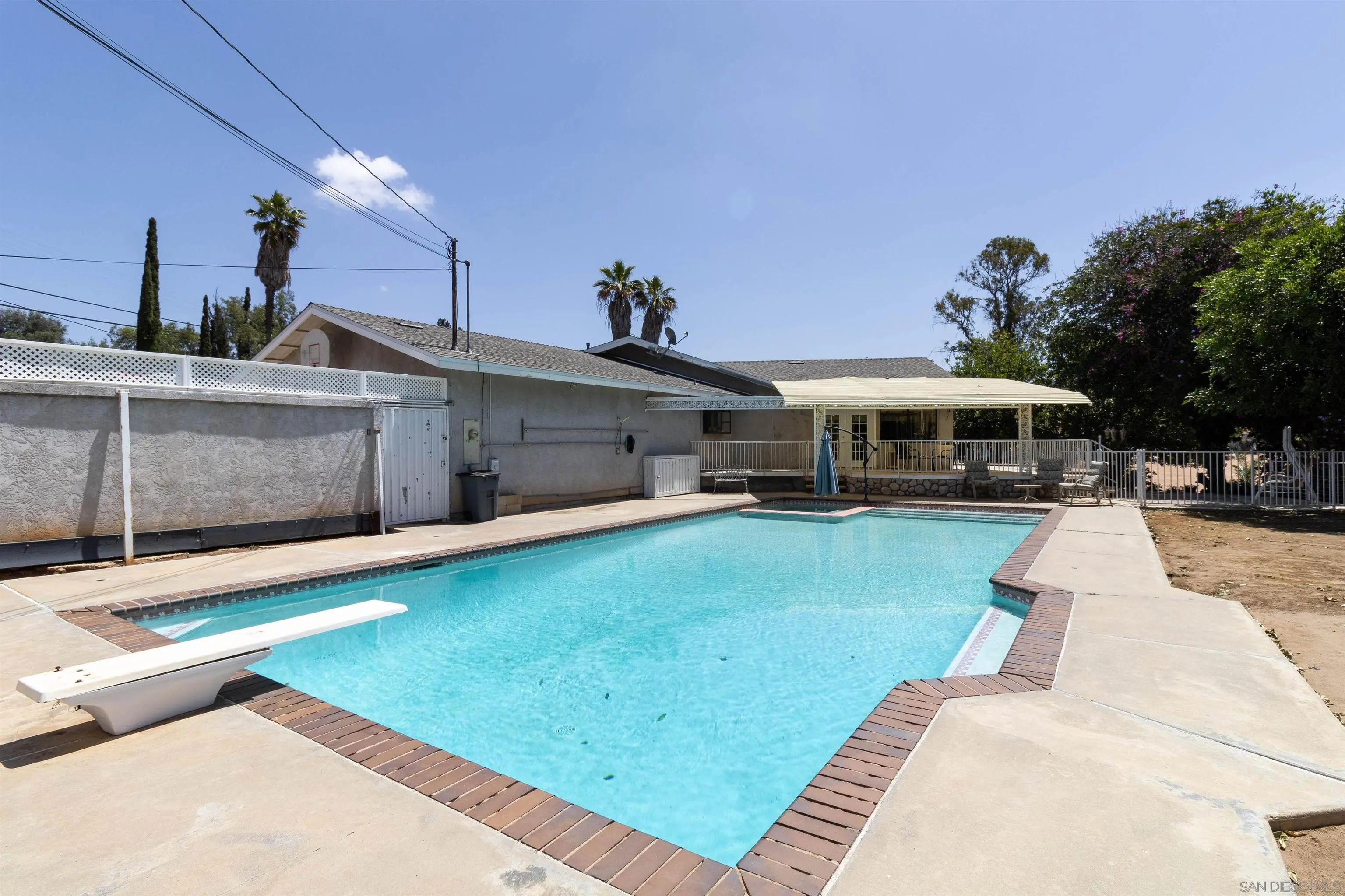 14011 Proctor Valley Road Jamul, CA 91935 - Photo 22 of 36 a front view of a house with a yard