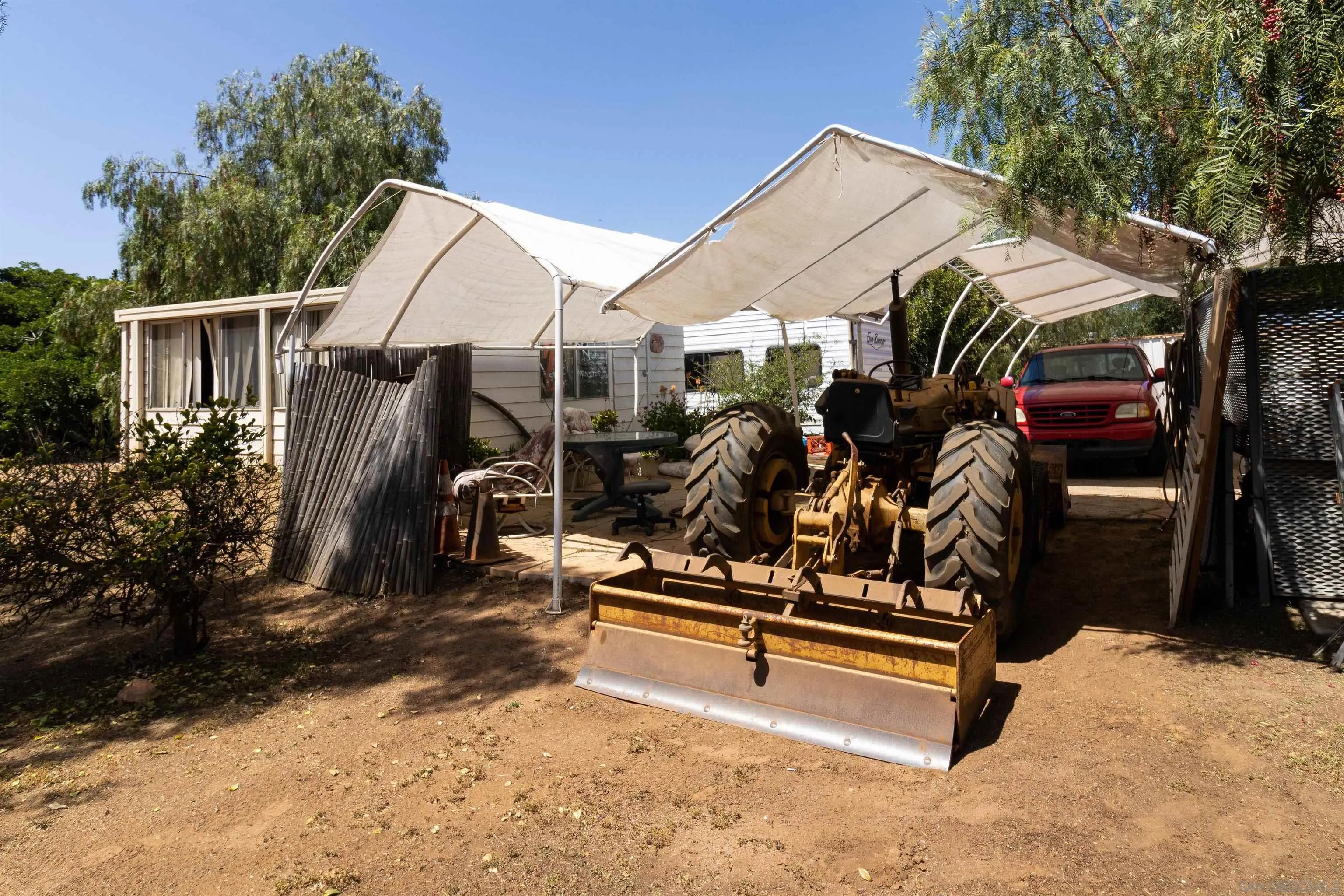 14011 Proctor Valley Road Jamul, CA 91935 - Photo 26 of 36 a view of backyard with wheel and chairs