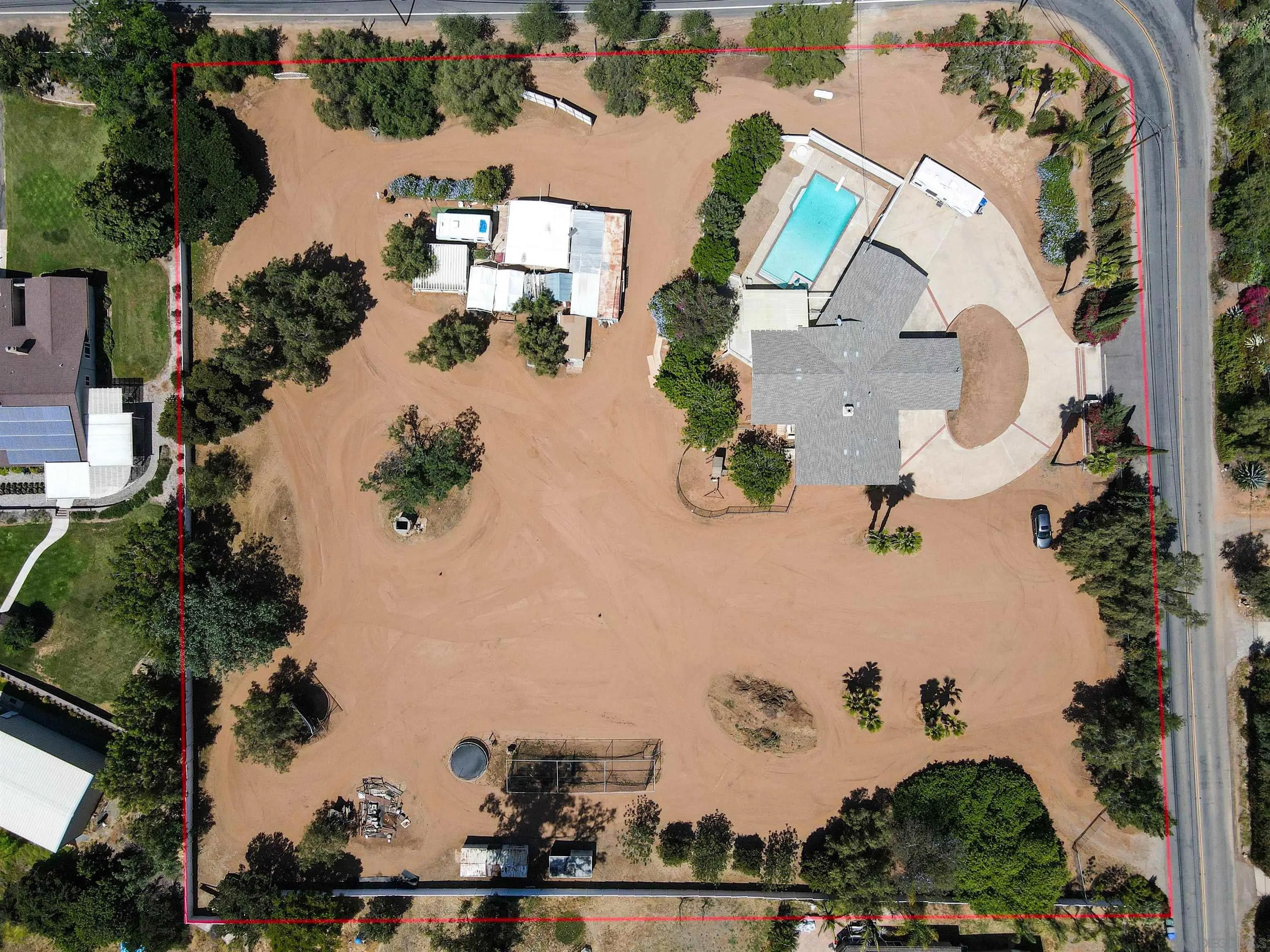 14011 Proctor Valley Road Jamul, CA 91935 - Photo 28 of 36 an aerial view of a house with outdoor space