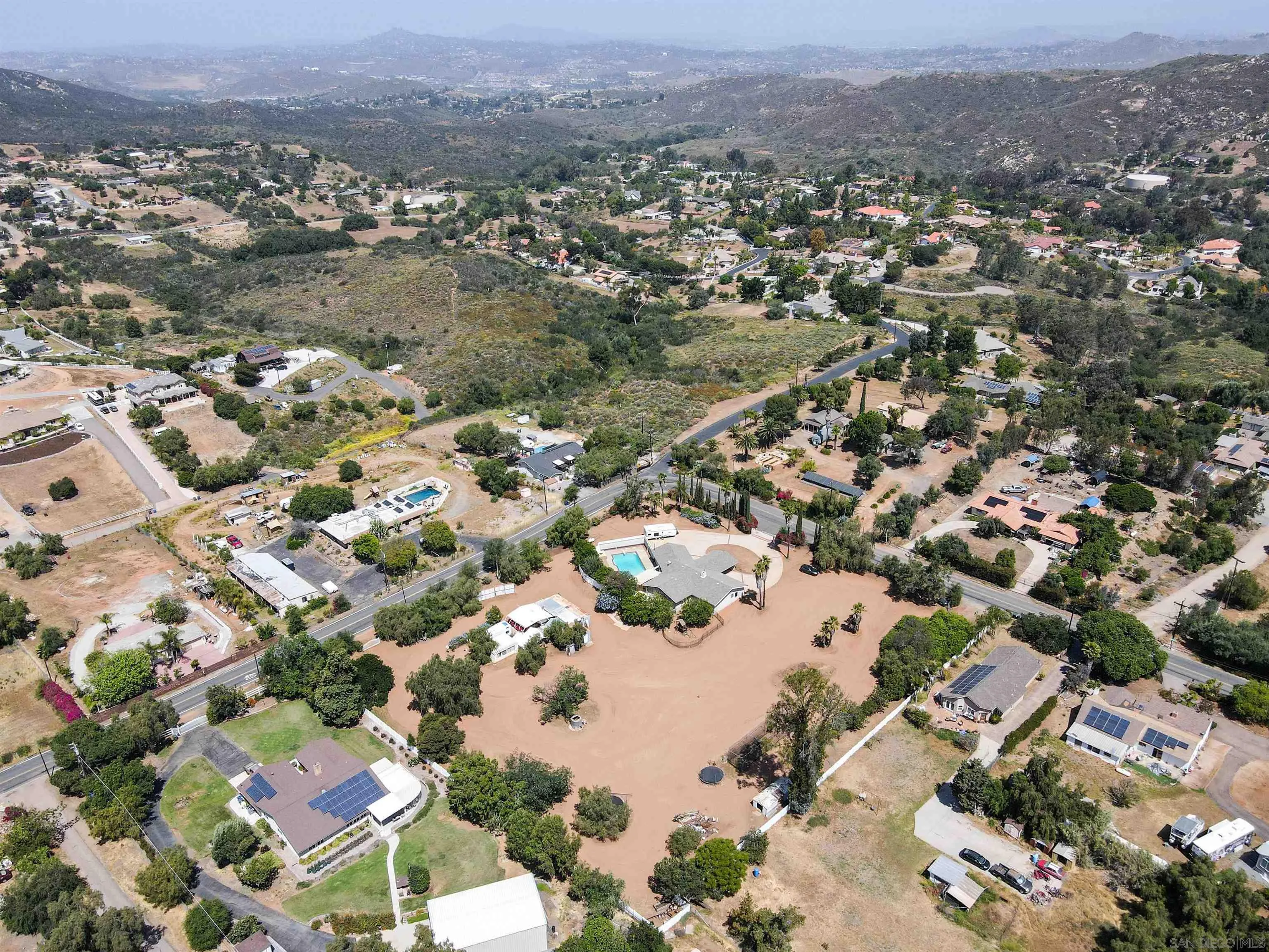 14011 Proctor Valley Road Jamul, CA 91935 - Photo 32 of 36 an aerial view of residential houses with outdoor space
