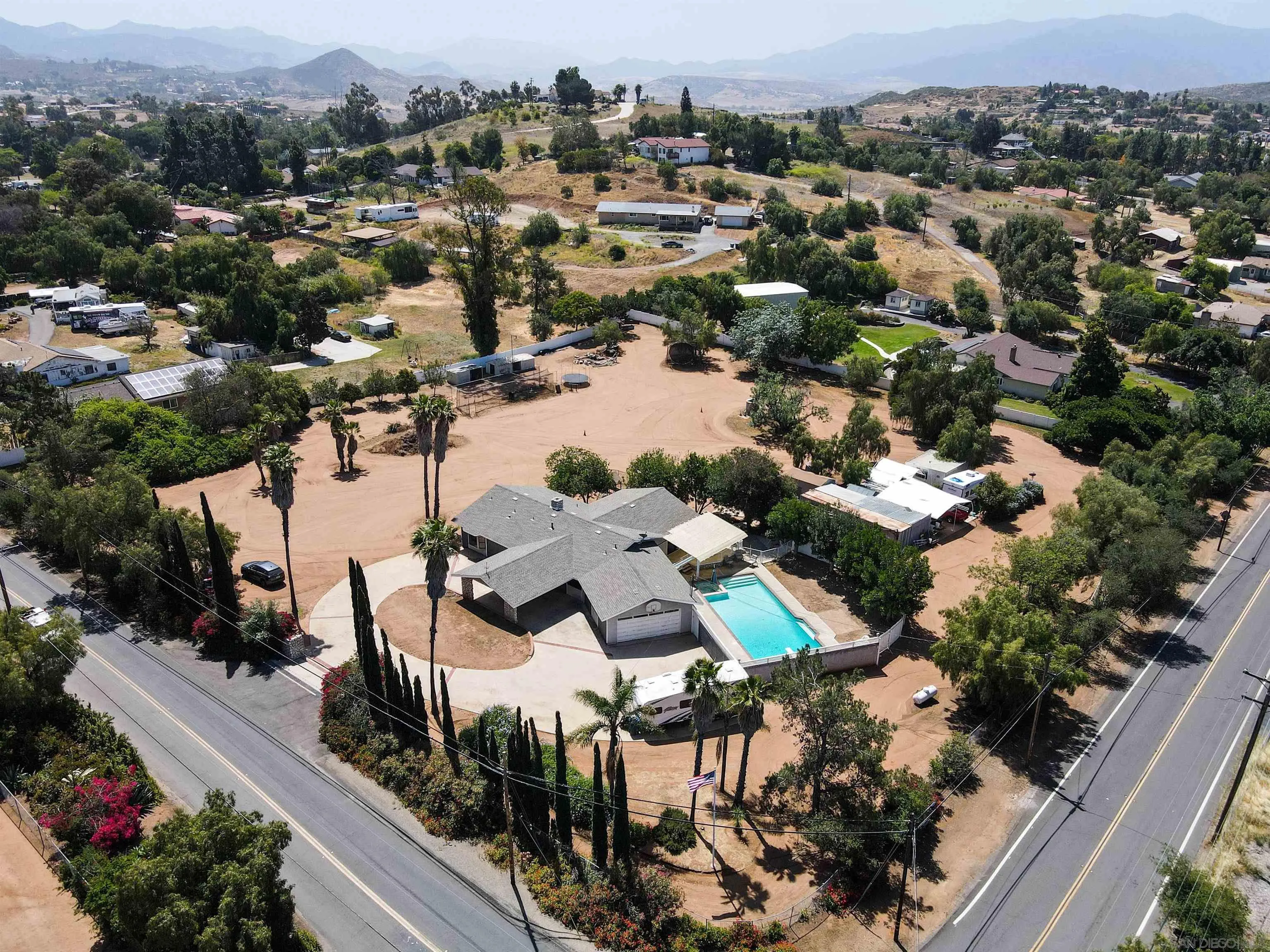 14011 Proctor Valley Road Jamul, CA 91935 - Photo 36 of 36 an aerial view of residential houses with outdoor space