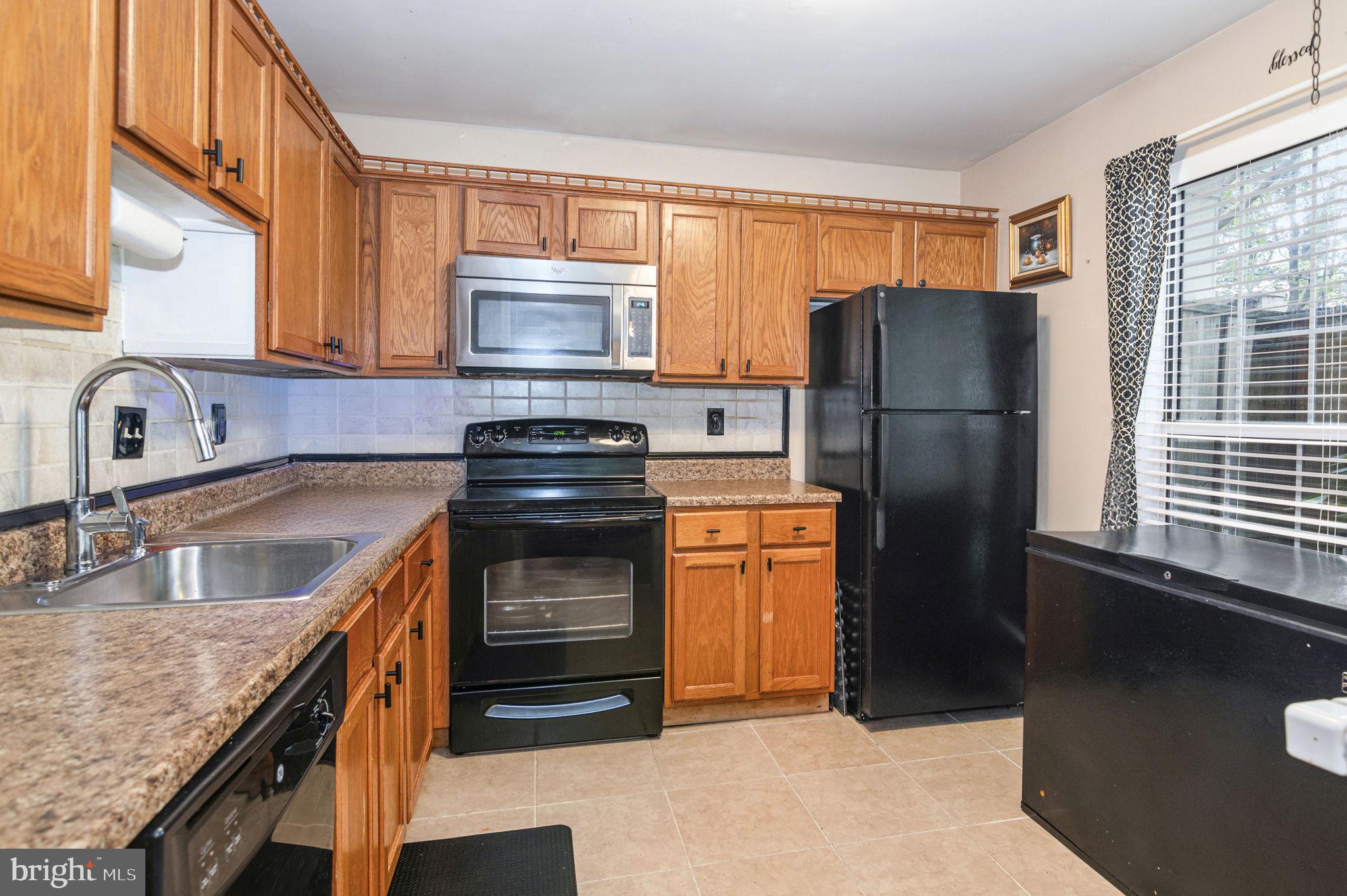 11180 Rienzi Place, Unit 102 Manassas, VA 20109 - Photo 9 of 34 Kitchen