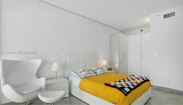 a living room with a couch and a table