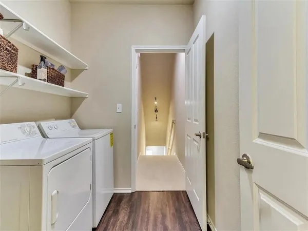 a bathroom with a sink and glass door