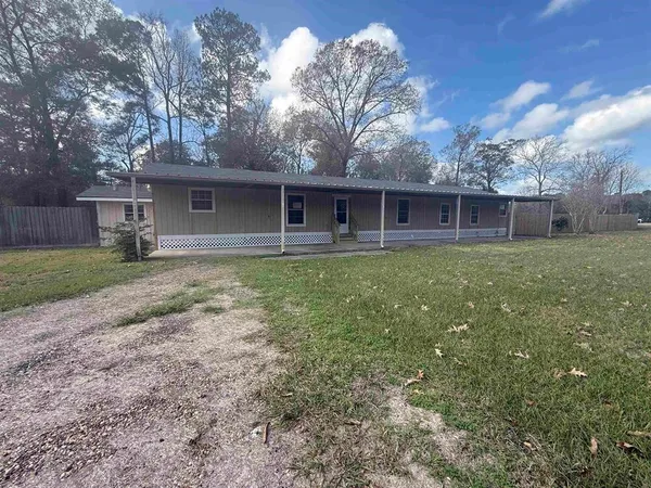 front view of a house with yard
