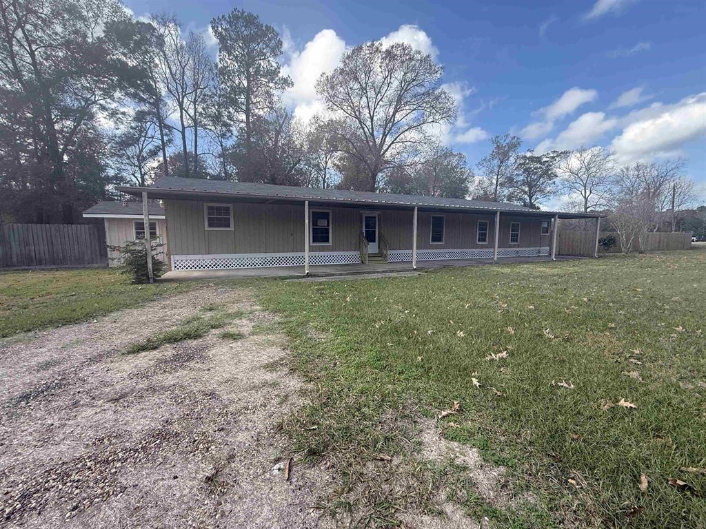 front view of a house with yard