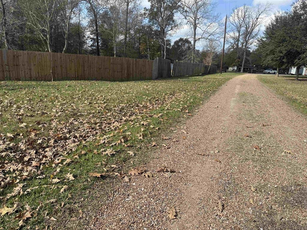 9283 Largent Road Hull, TX 77564 - Photo 4 of 22 a backyard of a house with lots of green space