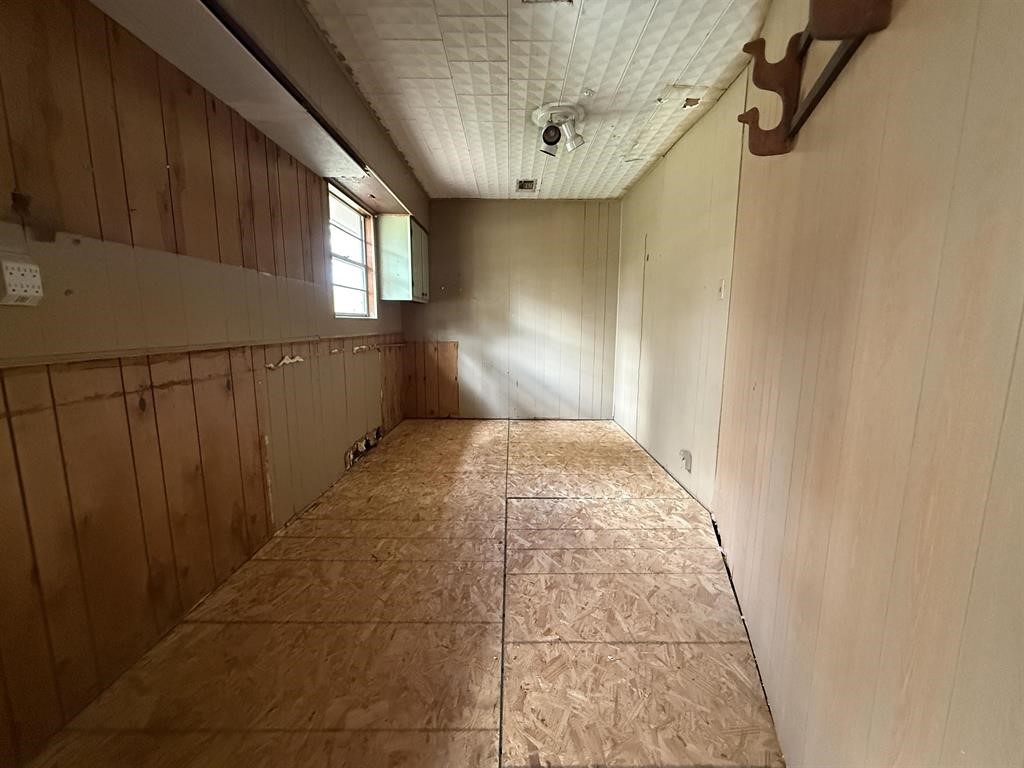9283 Largent Road Hull, TX 77564 - Photo 10 of 22 a view of an empty room with windows
