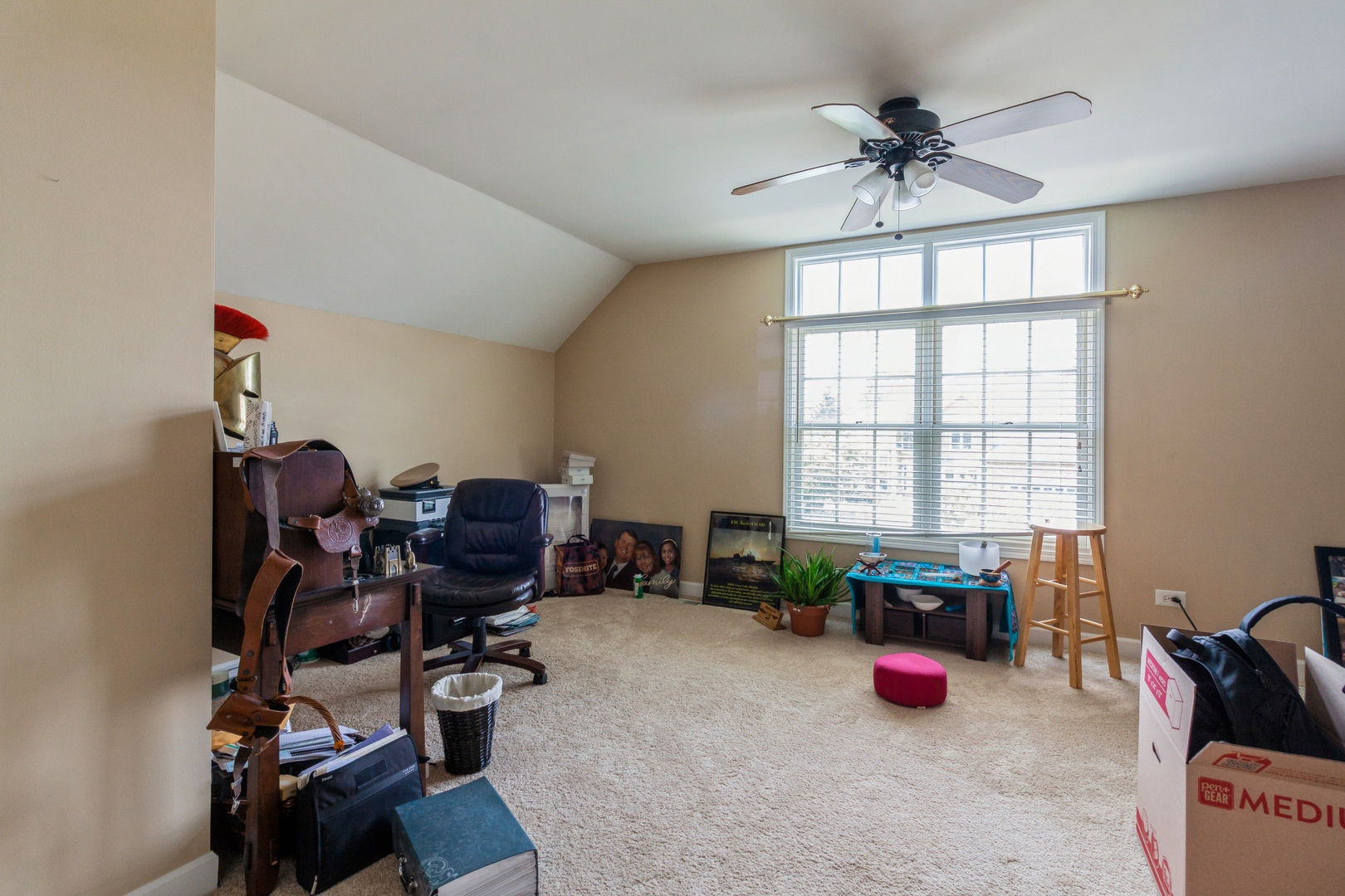 2908 Beth Lane Naperville, IL 60564 - Photo 16 of 19 a view of a workspace with furniture and a window