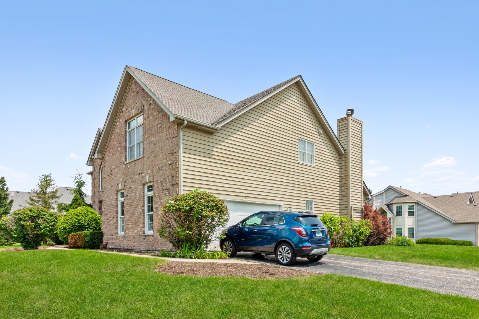2908 Beth Lane Naperville, IL 60564 - Photo 18 of 19 a car parked in front of a house
