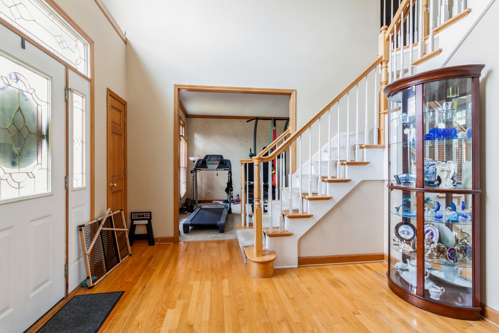 2908 Beth Lane Naperville, IL 60564 - Photo 2 of 19 a view of an entryway with wooden floor and windows