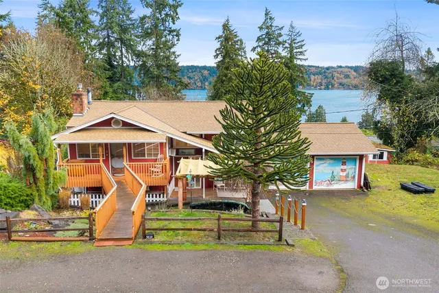 a aerial view of a house with swimming pool