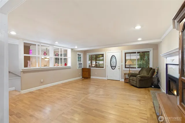 a bedroom with furniture and a window