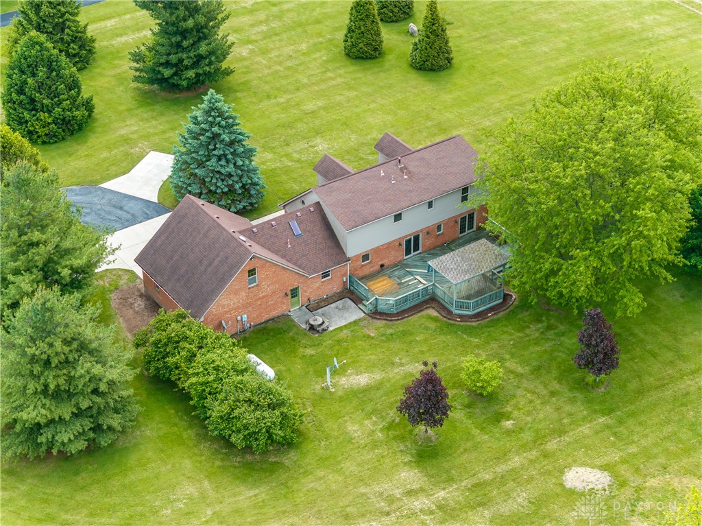9981 Ridge Acres Lane Englewood, OH 45322 - Photo 56 of 73 An aerial perspective reveals a residence with expansive grounds and outdoor living spaces.