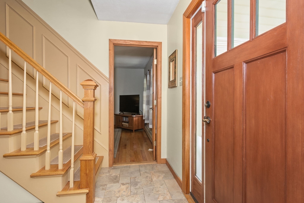 133 Dresser Hill Road Charlton, MA 01507 - Photo 15 of 42 a view of a hallway with wooden floor and staircase