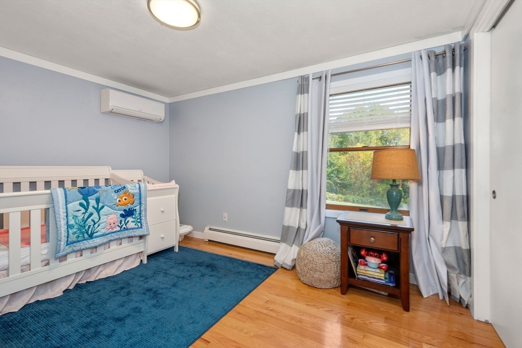 133 Dresser Hill Road Charlton, MA 01507 - Photo 18 of 42 a bedroom with a bed and a window