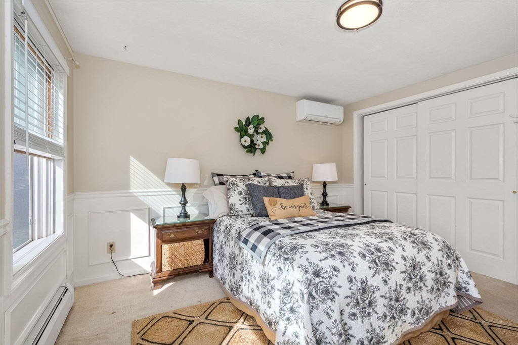 133 Dresser Hill Road Charlton, MA 01507 - Photo 19 of 42 a bedroom with a bed and window