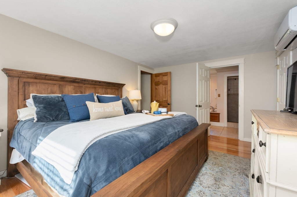 133 Dresser Hill Road Charlton, MA 01507 - Photo 20 of 42 a spacious bedroom with a bed and a dresser