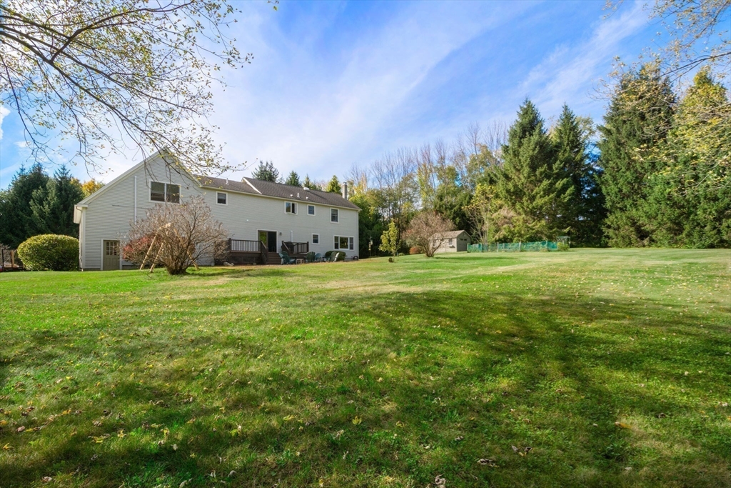 133 Dresser Hill Road Charlton, MA 01507 - Photo 36 of 42 a view of a garden with large trees