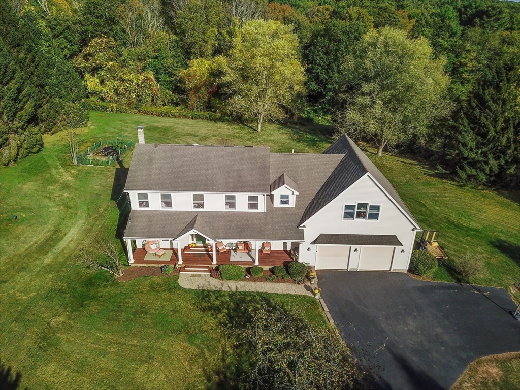 133 Dresser Hill Road Charlton, MA 01507 - Photo 37 of 42 a view of a house with a yard