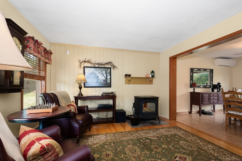 133 Dresser Hill Road Charlton, MA 01507 - Photo 5 of 42 a living room with furniture and a fireplace