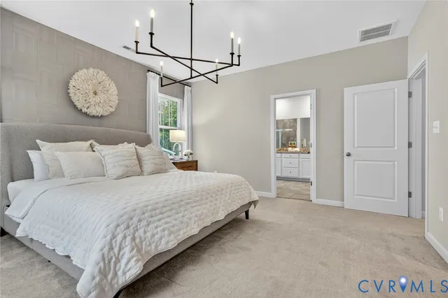 a bedroom with bed and window