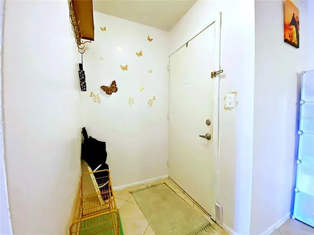 a bathroom with a window and a shower