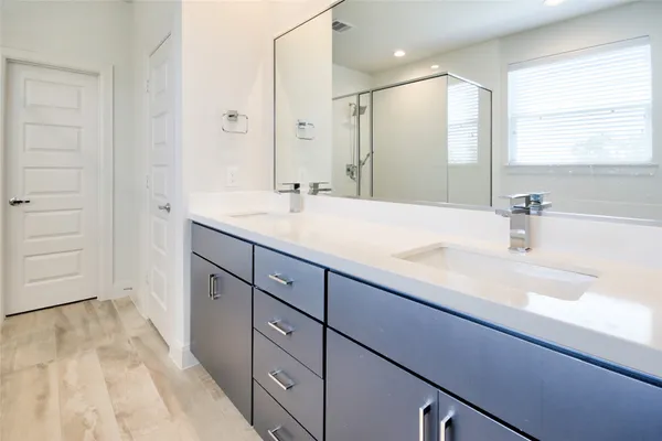 a white bath tub sitting next to a window