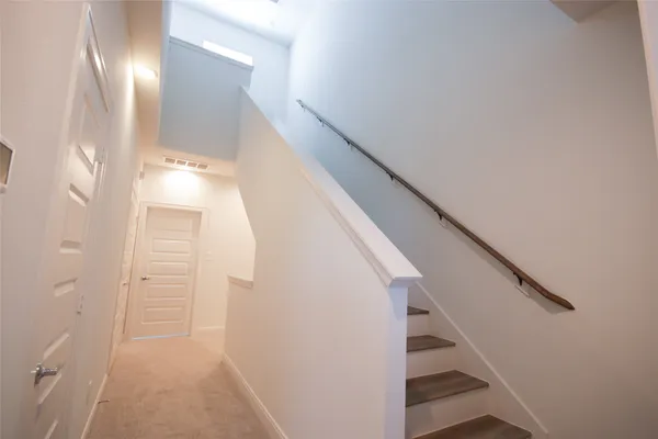 a view of house with garage