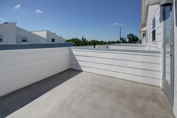 a view of a balcony with city view