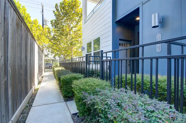 a view of a house with a small yard