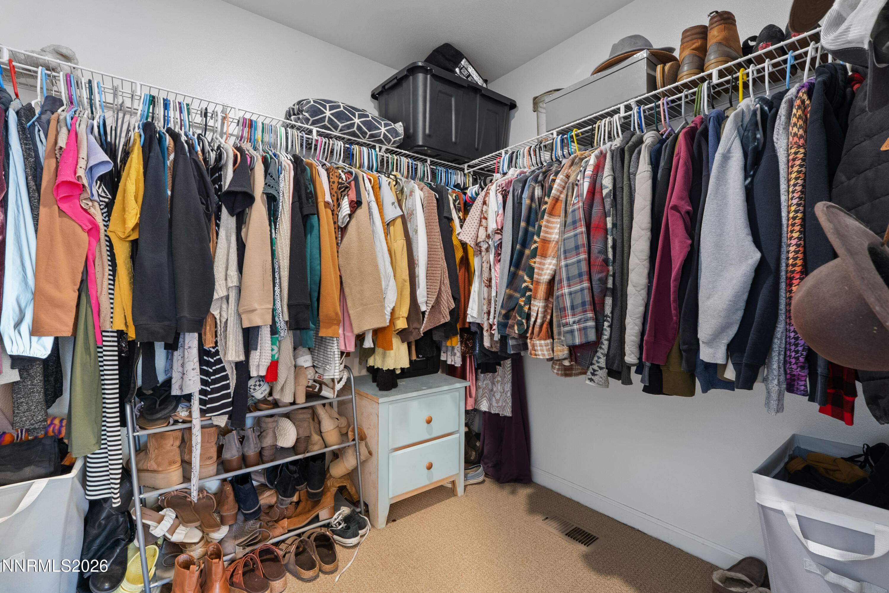 552 Spur Court Fernley, NV 89408 - Photo 31 of 46 a view of walk in closet with clothes and shoes