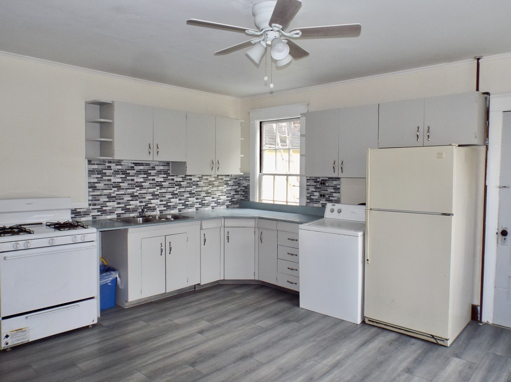 13 Church Street Colrain, MA 01340 - Photo 16 of 36 a kitchen with appliances a sink and cabinets