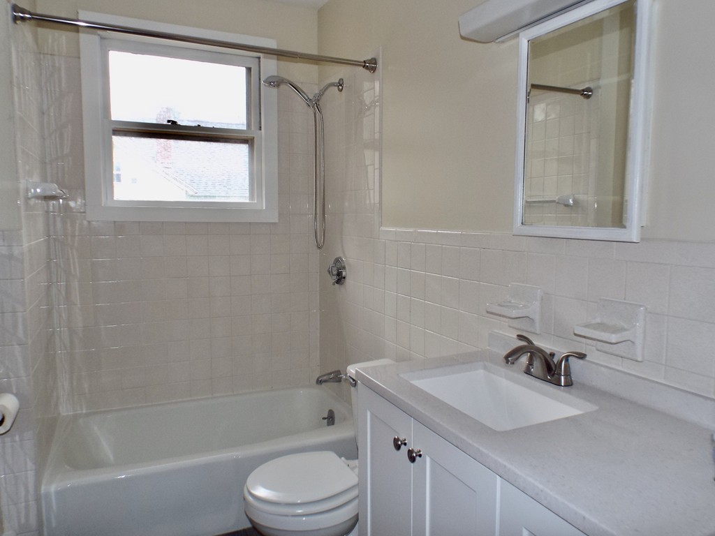 13 Church Street Colrain, MA 01340 - Photo 25 of 36 a bathroom with a granite countertop sink toilet and shower