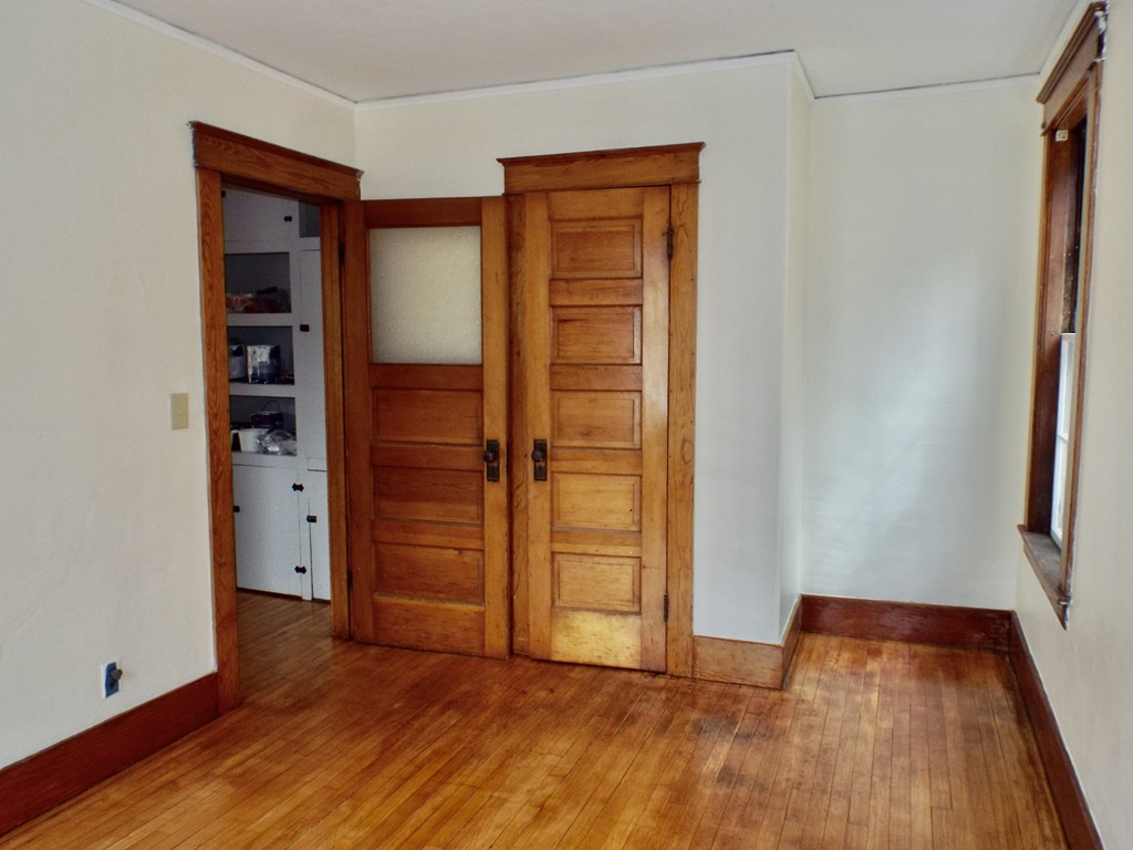 13 Church Street Colrain, MA 01340 - Photo 26 of 36 an empty room with wooden floor closet and windows