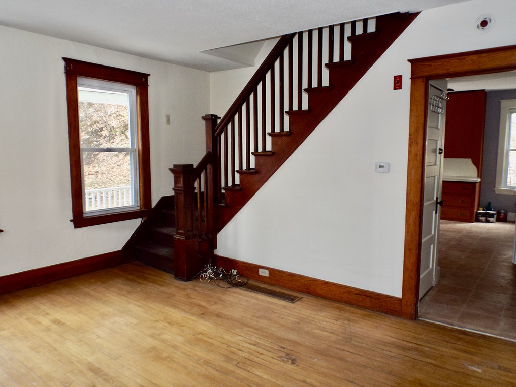 13 Church Street Colrain, MA 01340 - Photo 5 of 36 a view of room with window and wooden floor