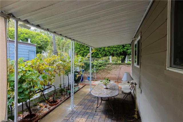 a outdoor dining space with furniture
