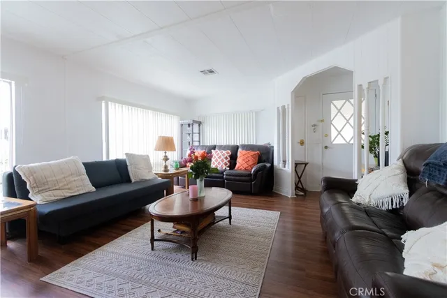 a living room with furniture and a couch