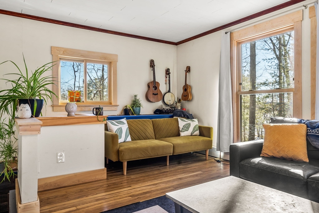 104 Island Road Lunenburg, MA 01462 - Photo 12 of 35 a living room with furniture and a large window