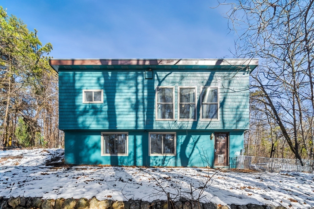 104 Island Road Lunenburg, MA 01462 - Photo 2 of 35 a front view of a house with a yard