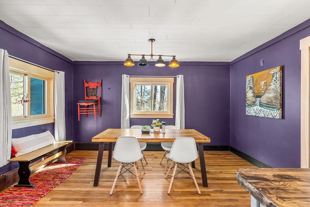 104 Island Road Lunenburg, MA 01462 - Photo 9 of 35 a view of a dining room with furniture and window